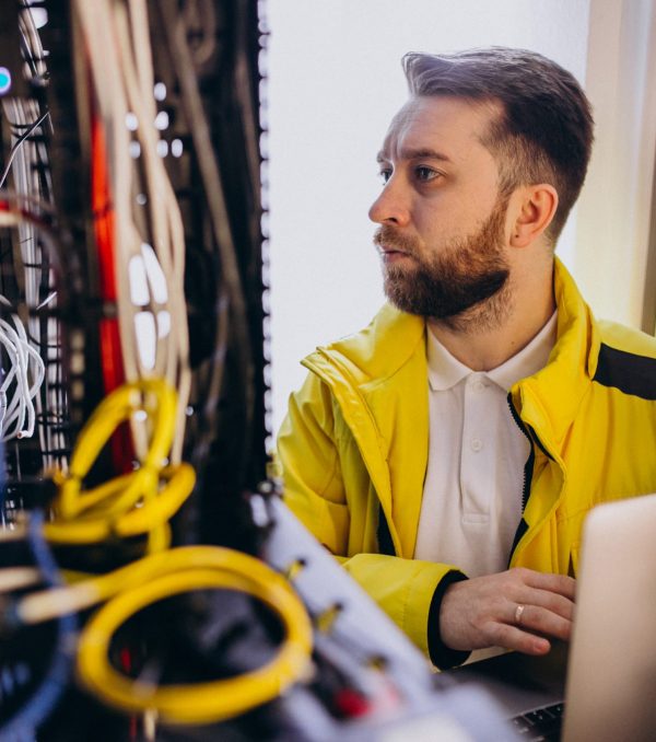 Young man engineer making program analyses